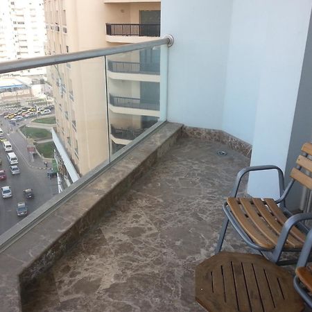 Hilton Alexandria Corniche Hotel Eksteriør bilde A balcony in a residential building in Cairo, Egypt